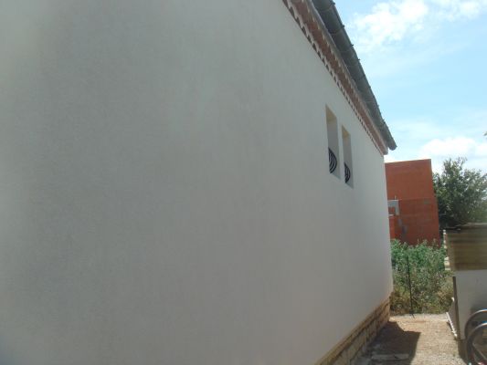 Ravalement d'une façade à Marignane d'une maison de ville